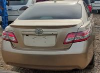 Gold coloured Toyota Camry